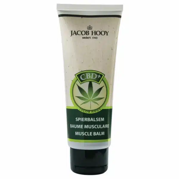 Een tube Jacob Hooy - CBD spierbalsem met een hennepbladlogo op het etiket.